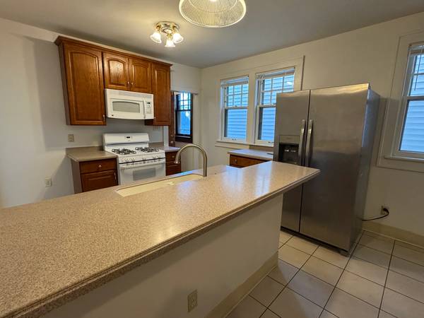 Lower 3 Bed/1Bath Duplex with Sunroom and Parking! 1