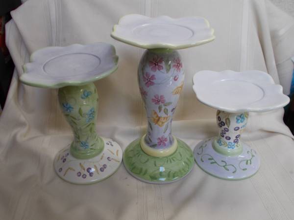 A set of three candels  holders 1