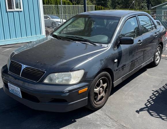 Lancer ES Mitsubishi 2002 - Título limpio - Necesita motor - $2,000 (Snohomish)63622830301315124
