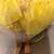 Vintage Porcelain Doll Wearing a Yellow Dress 2 thumbnail