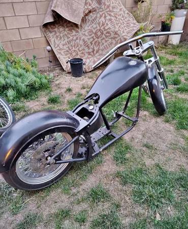 Unregistered Softail, raked Big Wheel rolling 1
