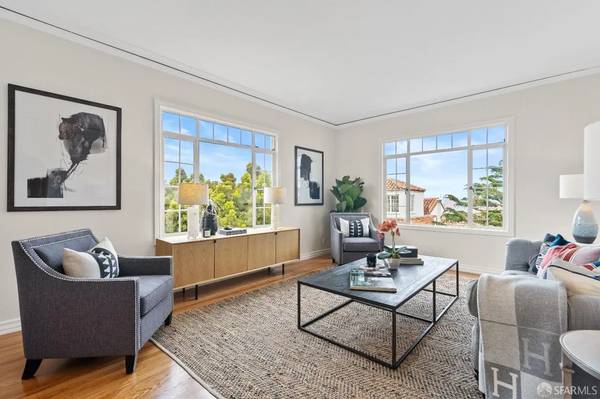 Rarely available, top floor one-bedroom corner condominium in heart of 1