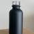 CASE of 1oz Matte Black Boston Round Glass Bottle (264 bottles) 1 thumbnail