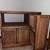 Solid oak TV stand with pull out shelving 2 thumbnail