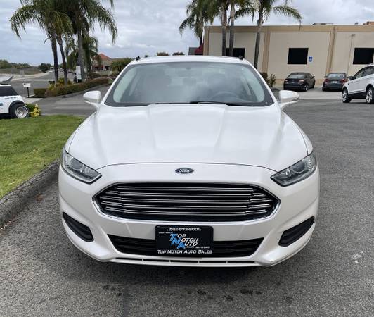 2014 Ford Fusion SE sedan White Platinum Tri-Coat Metallic - $7,997 (28046 Del Rio Rd Ste Abr)63440630205569121