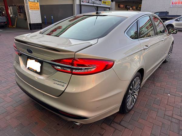 Ford Fusion Hybrid Titanium 2018 - $7500 (Jackson Heights)63473234019203123