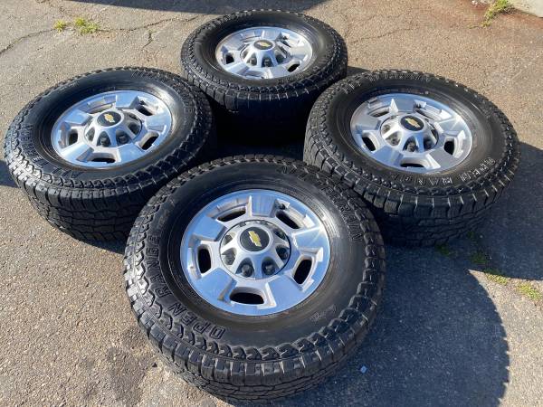 Factory 17” chevy / Gm 8 lug (8x180) alloy rims & 285/70LT17 tires - $58063471458653313124