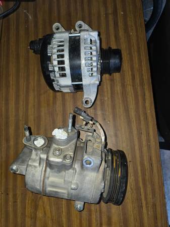 Ford explorer  2017  ac compressor and alternator 1