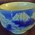 mountain/sky patterned Japanese porcelain bowl 1 thumbnail