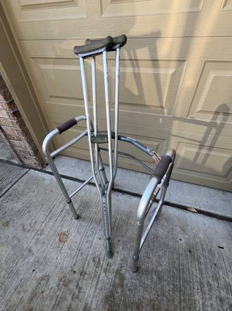 Walker, walking cane and a pair of crutches 1