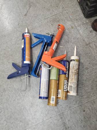 3 caulking guns and refill tubes 1