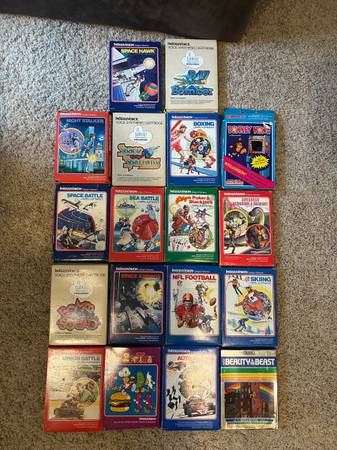 Intellivision game cartridges, voice synthesizer and consile 1