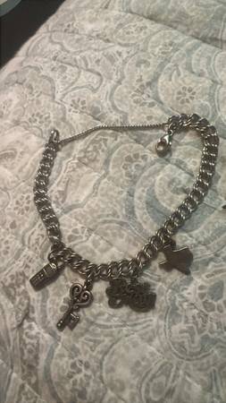 James avery meduim curb bracelate with 4  charms needs cleaning 150.00 1