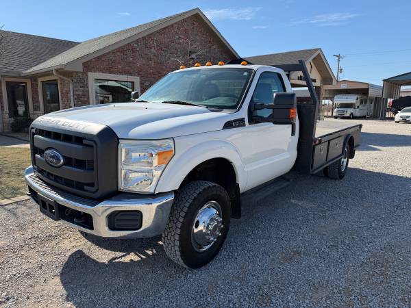 2015 FORD F350 REG CAB GAS 4WD W/ SKIRTED FLATBED 1