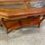 54.5”W Quality two-tiered wood hall console table with a glass top 1 thumbnail