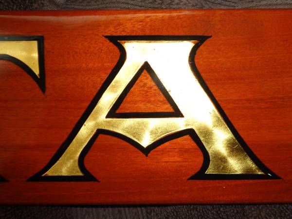 24kt gold leafing names etc. on wooden boats.................50 years 1