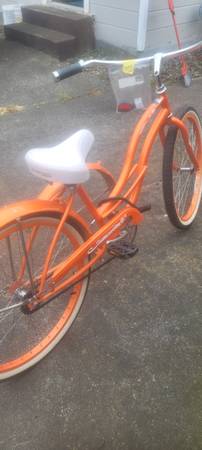 orange womens bicycle sixthreezero Dreamcycle Single Speed The Tracer Avera Beach Cruiser Bike for women features 26 wheels Dutch Bike Orange Ladies Bike