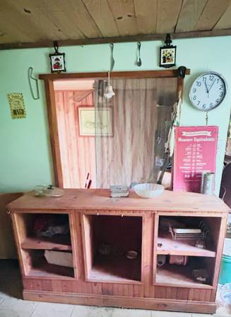 2 Custom built kitchen storage units and mismatched barstools 1