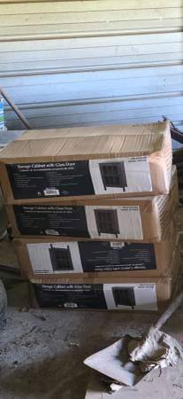 Storage bin cabinet with glass door. New in box 1