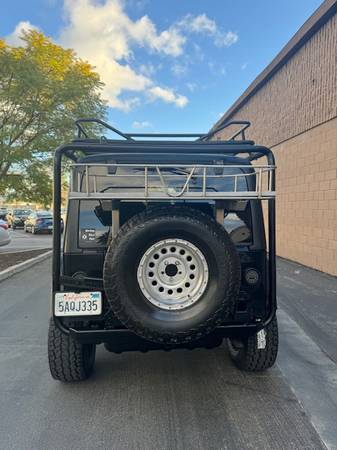 2003 Jeep Wrangler elevado, transmisión manual, negro y negro - $16,250 (Escondido)63440849313665123