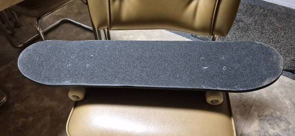 All Black Skateboard 1