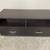 47” W Tv Stand, two drawers 20" H stainless feet 1 thumbnail