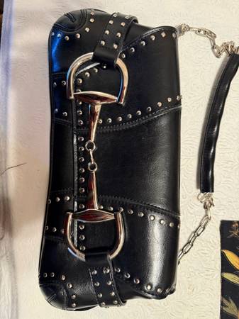 Rina rich handbag. 1