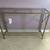 Console table - gold with glass top 1 thumbnail