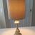 Modern Transitional Brushed Gold Table Lamp with Textured Drum Shade 1 thumbnail