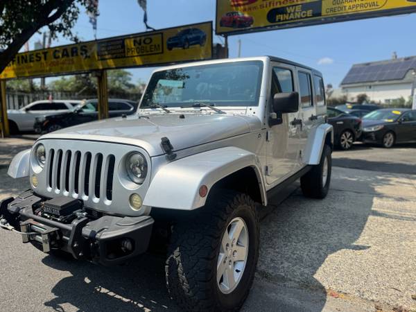 2012 Jeep Wrangler Unlimited Sahara 4x4 - $12.995 (Staten Island)63476897576323122
