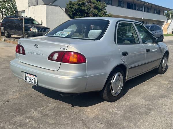1999 Toyota Corolla CE - $4,99563618334309635124