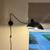 2 black metal angled adjustable wall sconces 1 thumbnail