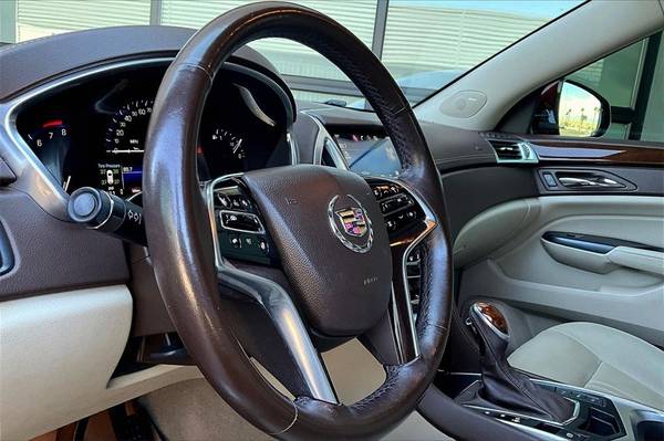 2014 Cadillac SRX Premium - $14,000 (Cadillac SRX Sedán)63469596199937123