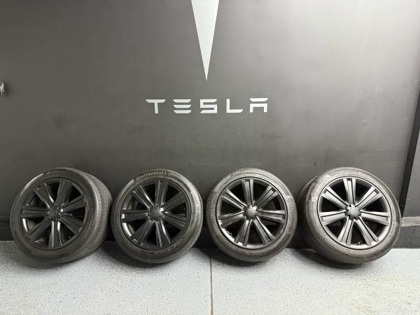 Tesla Model S 19 inch Tempest Wheels with Arachnid Covers and All Season Tires 1