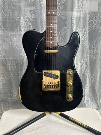 Vintage Fender Collector's Edition "Black and Gold" Telecaster 1