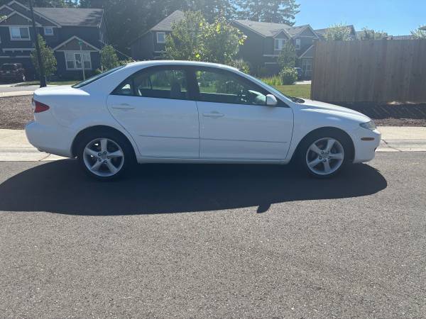 2005 Mazda 6 sedán de 4 puertas, pocos kilómetros 115k, todo original limpio, título - $2,900 (Tacoma)63654705474947124