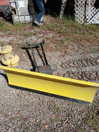 48" John Deere snow plow, weights, & chains 1