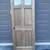 2 Light 4 Panel Solid Wood Exterior Door. 32" X 80". Nice. 1 thumbnail