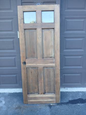 2 Light 4 Panel Solid Wood Exterior Door. 32" X 80". Nice. 1