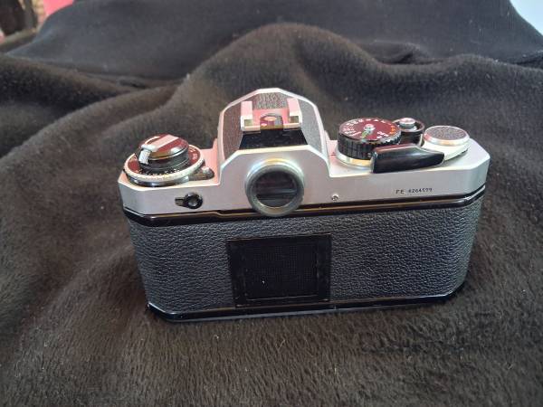 Vintage silver Nikon FE 35mm SLR - photo/video - by owner