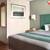 Flat Screen TVs with Cable Channels, Furnished Suites, Stove Top 4 thumbnail