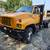 1998 GMC C6500 16FT Flatbed Dump 1 thumbnail