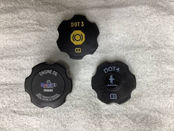 C-6 Oil filler- Brake Reservoir + Clutch Reservoir Covers 1