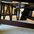 Dark Solid Wood Counter Height Rounded Triangle Dining Table 52.5Lx52. 2 thumbnail