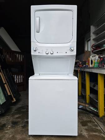 Like new GE Laundry Center Stacked Washer Dryer 1
