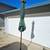 9 ft. Outdoor Tiltable Green Umbrella and Umbrella Base 2 thumbnail