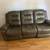 Brown leather dual recliner with one batter pack 1 thumbnail