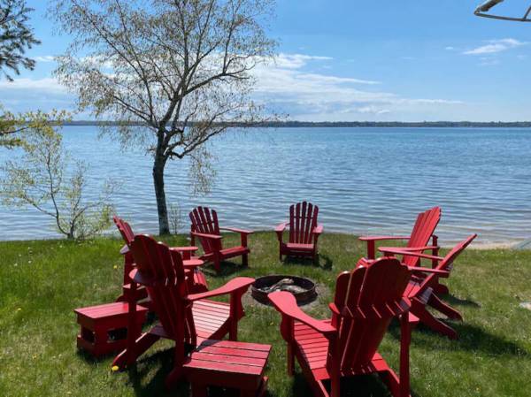 $240 / 4br - Perfect Northern Michigan vacation, Sunset views of the Best Lake in Michigan! (@3785 NE Torch Lake Dr, Central Lake)64037722798211121