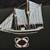 Rare nautical shadow box features a central sailboat model surrounded 3 thumbnail