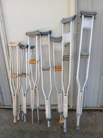 Walkers, crutches, shower chair, porta-potty 1